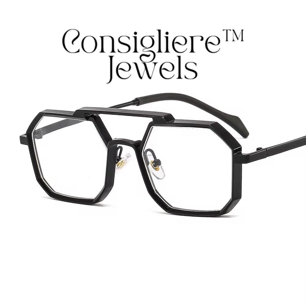 The Consigliere™ Jewels Luxury Sunglasses are stylish and classic unisex sunglasses featuring a black metal frame with polycarbonate lenses that provide UV400 protection. The sunglasses are personalized with laser engraved branding, making each pair unique. With a polygonal design theme reminiscent of the 80s and 90s, these sunglasses offer a touch of old-school charm in a modern frame. The temple length is 151mm, making them comfortable and fashionable for everyday wear.