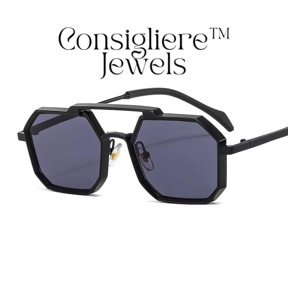 The Consigliere™ Jewels Luxury Sunglasses are stylish and classic unisex sunglasses featuring a black metal frame with polycarbonate lenses that provide UV400 protection. The sunglasses are personalized with laser engraved branding, making each pair unique. With a polygonal design theme reminiscent of the 80s and 90s, these sunglasses offer a touch of old-school charm in a modern frame. The temple length is 151mm, making them comfortable and fashionable for everyday wear.